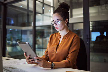 Image showing Woman working in Toronto office at night, big data analytics and reading expert research on digital tablet. Database administrator in dark, overtime work on company report and iot in tech business