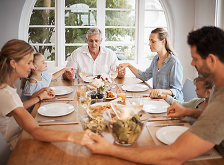 Image showing Family, thanksgiving food or holding hands prayer in house or home for men, women or kids. Children, girls or grandparents in traditional celebration lunch meal with worship parents, mother or father