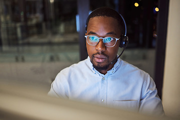 Image showing Call center, phone call and customer service black man at office of telemarketing, support and consulting business. Help desk, consultant and contact us agent speaking, work and advice at crm company