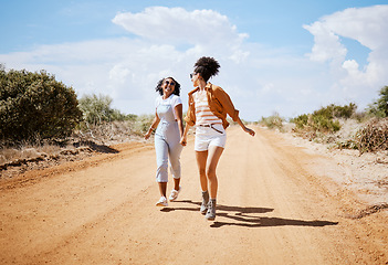 Image showing Energy, friends and travel with women walking on a dirt road, explore nature and freedom. Adventure, vacation and black women having fun and bonding in Mexico, carefree and cheerful and enjoying trip