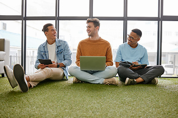 Image showing Laptop, tablet and businessmen in creative office working online for startup career. Work, business and digital technology in ecofriendly workplace. Team of men talking on floor in workspace