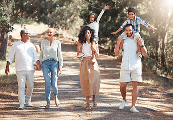 Image showing Happy family, fun and freedom with laughing kids and playful grandparents bonding on a walk in a nature. Love, cheerful and relax with playful family enjoying an active walk in park, peaceful cardio