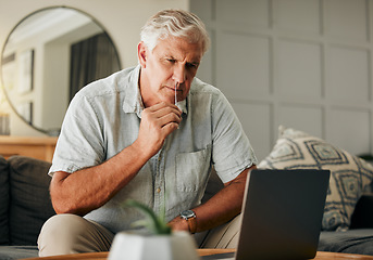 Image showing Covid, pcr and laptop with senior man watching online tutorial or video for medical help for self test antigen rapid kit on home sofa. Old male doing nasal swab for coranavuris in Australia house