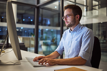 Image showing Businessman, computer and night office work for digital programmer, cybersecurity and software design. Thinking web design engineer, developer and worker with technology for ux seo or database coding