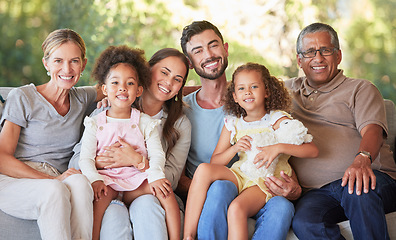 Image showing Portrait family, interracial smile and grandparents happy on living room sofa with children, smile together in lounge and relax on couch in house. Kids, mother and father with senior people for visit