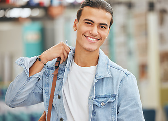 Image showing Man, smile and happy with backpack for travel, study or work on walk in portrait. Person, bag and attractive happiness on face as tourist walking in city, airport or bus station in Los Angeles