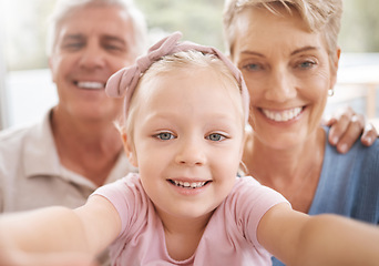 Image showing Girl, grandparents and family selfie portrait in home having fun spending quality time together. Love, support and grandma, grandpa and kid taking a picture, bonding and smile, laughing and joy.