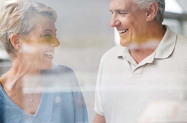 Image showing Senior, couple and happy love of woman and a man laughing together in retirement. Elderly people enjoy a funny conversation with happiness, joy and life gratitude smile in a house speaking