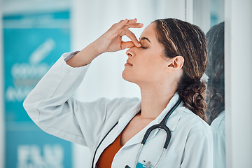 Image showing Stress, anxiety and depression doctor in a hospital or clinic suffering from sad, challenge and fail. Woman healthcare or medical worker with mental health, frustrated and headache from work burnout