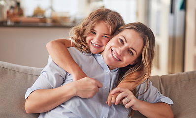 Image showing Girl, mother and sofa show love in home, happy and smile together in living room. Mom, child and couch show happiness, hug and relax in school holiday in portrait at family home in Dallas, Texas