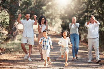 Image showing Nature, running and happy family cheering on children in a park having fun on summer holiday vacation in New York. Mother, father and grandparents supporting kids in a playful race for exercise