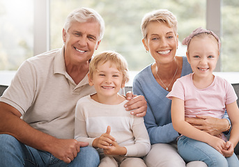 Image showing Portrait, kids and grandparents relax on a sofa, bonding and smiling in living room together. Family, happy and retirement with elderly man and woman enjoying free time and babysitting grandchildren