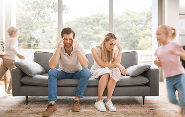 Image showing Noise, headache and stress with children and parents in a living room, overwhelmed by adhd kids energy. Burnout, anxiety and family in crisis, suffering from behaviour problem and fatigue