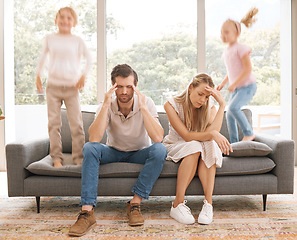 Image showing Stress parents, kids and jump on sofa in living room child problem for tired, sad and overworked mom and dad at home. Burnout, unhappy and sad mother and father on lounge couch with trouble children