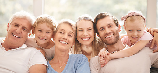 Image showing Mother, father and grandparents with children in a big family indoor portrait together enjoying quality time in Australia. Mama, dad and siblings love being with an old man and senior woman at home