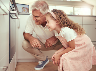 Image showing Grandfather and girl child in kitchen cooking oven food together and excited for results. Happy family, learning and love from elderly senior man with kid baking for happy holiday home celebration