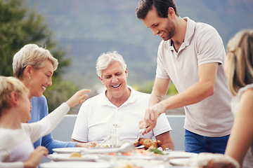 Image showing Family eating lunch outdoor garden for holiday celebration, fathers day or thanksgiving turkey food. Happy, care and love people with grandparents and child brunch together in garden to celebrate dad