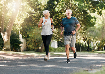 Image showing Road running, fitness and senior couple training together on a exercise and workout run. Sports and health motivation of elderly man and woman runner in retirement living a healthy lifestyle