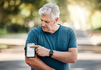 Image showing Senior man, phone band and fitness with music earphones in nature park, environment or Australian garden. Mature runner with 5g mobile technology for radio playlist, exercise training and workout app