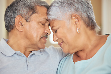 Image showing Senior couple, forehead touch and love in house or Indonesian home living room in support, trust and security. Zoom, face and retirement elderly man and happy woman in marriage therapy and counseling