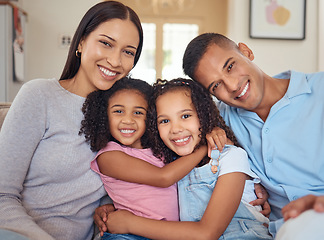 Image showing Portrait, happy family and living room sofa hug, smile and bonding for love, happiness and joy together at home. Parents of mother, father and girl children or kids on lounge couch smiling at house