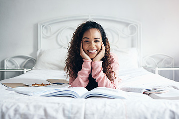 Image showing Student books and bed with black woman learning and studying in a bedroom, happy and excited. Study, education and college preparation with portrait of girl with vision, thinking of goal and reading