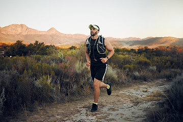 Image showing Fitness, training and exercise man running outdoor for a workout. Ambitious latino athlete run and exercising for a marathon. Male runner on nature trails jog to increase cardio health and wellness