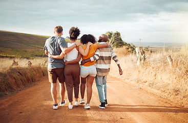 Image showing Hug, friends and walking with back view in countryside for group holiday bonding moment together. Support, care and love in friendship with people enjoying South Africa dirt road walk on vacation.