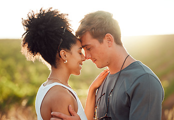 Image showing Love, travel and couple in mexico, hug and share intimate moment in countryside, bond at sunset. Freedom, nature and interracial man and woman embrace, talk and enjoy relationship in florida field
