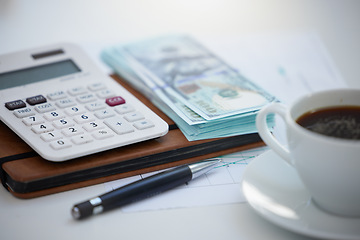 Image showing Zoom of finance, money or calculator with cash on an accounting desk in an accountant office. Wealth, savings and investment with dollar notes on a table for growth, inflation or stock in the economy