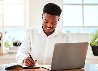 Image showing Internet, laptop and black man writing in notebook, happy freelance worker. African businessman with smile doing online research, taking notes for startup idea or project at desk and in modern office