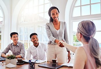 Image showing Welcome handshake, teamwork and CEO in business meeting agreement partnership, collaboration and congratulations. Black woman, thank you and boss in b2b contract success strategy or leadership deal