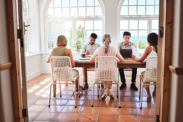 Image showing Business people, startup and diversity team in marketing busy at work sitting in modern office. Group of diverse creative employee workers in planning, strategy or company project in conference table