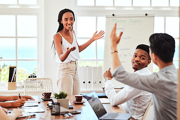 Image showing Training, workshop and question with a black woman leader giving presentation in meeting for coaching, learning and data. Collaboration, strategy and teamwork with a man raising hand for interaction