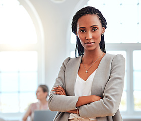 Image showing Portrait, African American woman and leader stand in office confident, relax and happy for successful business. Proud, female entrepreneur and black lady crossed arms, motivation and startup company