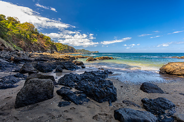 Image showing Playa Ocotal and Pacific ocean waves on rocky shore, El Coco Costa Rica