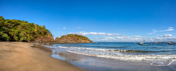 Image showing Playa Ocotal and Pacific ocean waves on rocky shore, El Coco Costa Rica