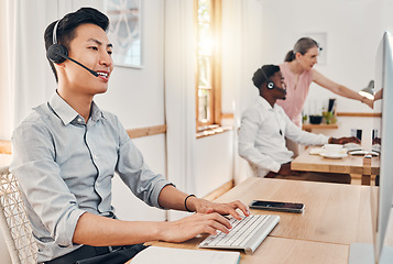 Image showing Call center worker, contact us and telemarketing employee listening to a client giving them their payment data. Ecommerce professional with customer support services on crm while consulting in sales