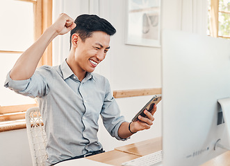 Image showing Happy, excited and celebration, man with phone in startup office gets text or email with news on investment reward. Success, celebrate and winner businessman from Japan at desk reading profit report.