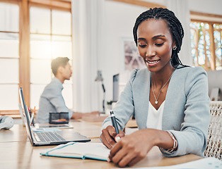 Image showing Black, business woman and writing in notebook for planning schedule or idea working in the office. Happy African American female employee taking notes for corporate finance at the workplace