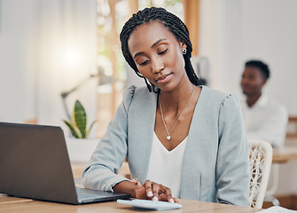 Image showing Accounting, business and black woman typing on calculator while working on the web in office at work. African accountant working and planning in finance on a laptop for financial corporate company