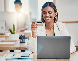 Image showing Credit card, online shopping and business woman reading information for payment of product on the web. Indian worker happy about sale on the internet with computer at a desk in an office at work