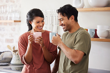 Image showing Happy, kitchen and couple in morning conversation together with cup of coffee at their home. Happiness, love and young man and woman from Mexico drinking tea, bonding and talking with smile in house.