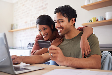 Image showing Ecommerce, happy online shopping and couple with credit card and laptop in kitchen in India. Computer, smile and man and woman making online payment, surfing internet website for sale or discount.