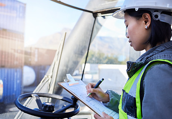 Image showing Cargo, shipping and woman in truck writing inventory notes on clipboard in shipment yard. Professional freight worker with checklist for organisation, logistics and stock distribution plan.
