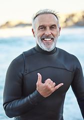 Image showing Elderly, surfer and beach with hand sign for portrait with smile in summer by ocean for wellness, fitness and health. Senior, man and surf by sea in retirement on vacation, holiday or travel to Miami