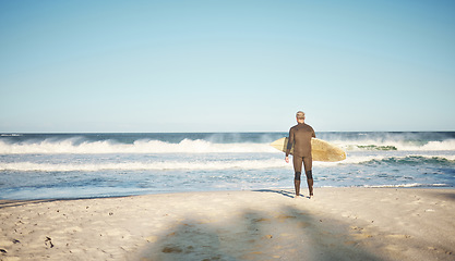 Image showing Surf, nature and sea waves with a senior man surfer ready for exercise and water workout outdoor. Surfing fitness, beach training and sports cardio of an athlete on a sport adventure with mockup