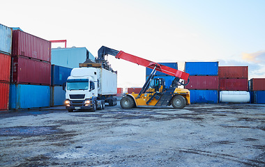 Image showing Logistics, shipping and container with truck and forklift in cargo warehouse for supply chain, delivery and export industry. Economy, ecommerce and global in factory port with transportation