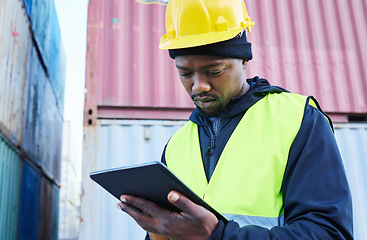 Image showing Digital tablet, logistics and black manager working on outdoor cargo freight site with shipping containers. African industrial man employee planning delivery, shipping and supply chain on mobile.