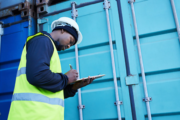 Image showing Warehouse, management and shipping logistics with man manager writing checklist for stock, delivery and inventory. Freight, supply chain and cargo control with black man checking ecommerce orders